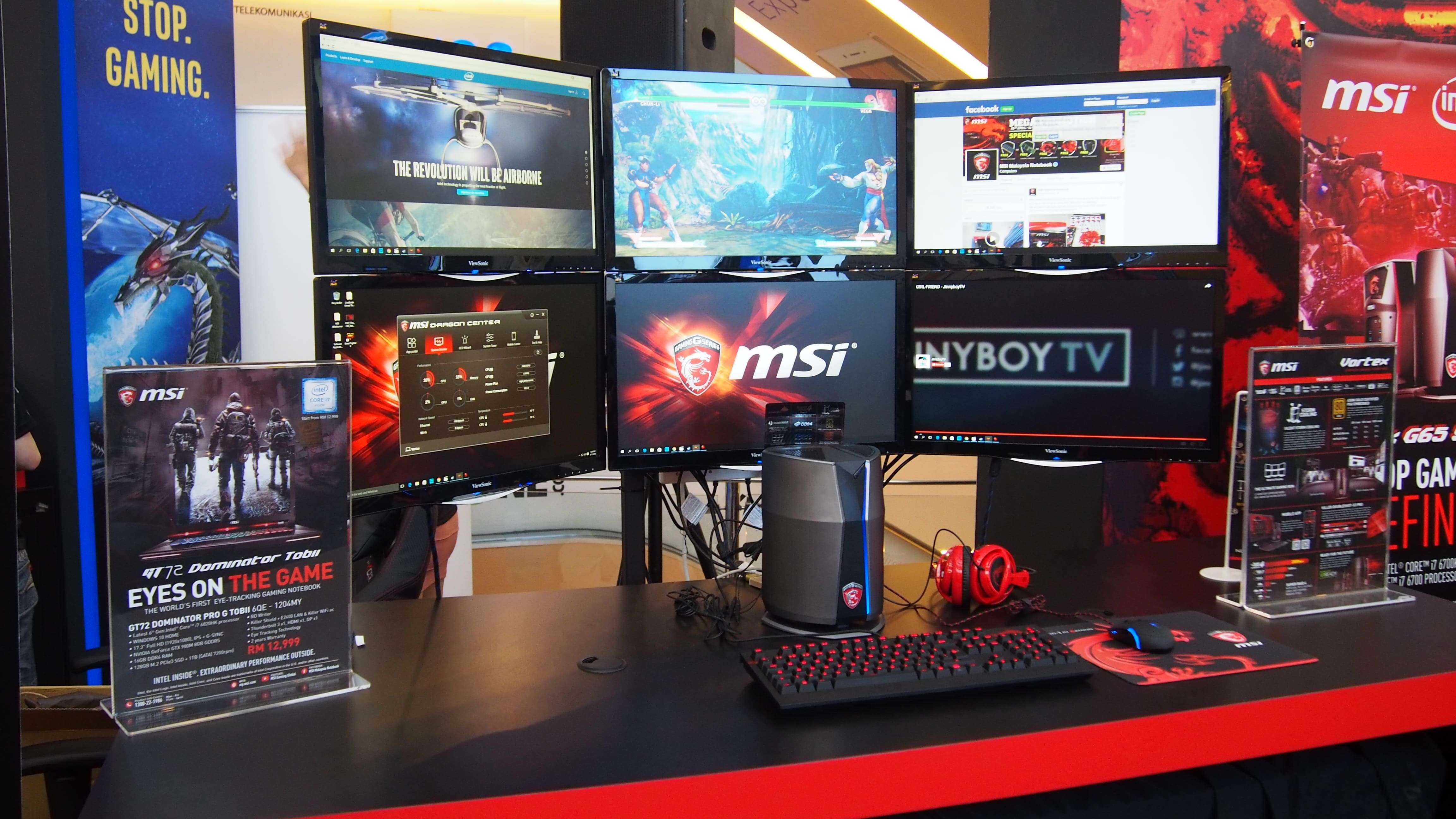 Here's a picture I took to show how it scales in real life with monitors!