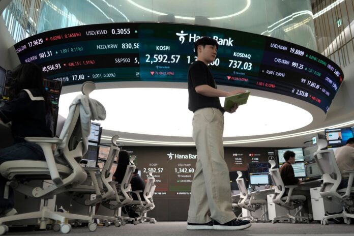 breaking-asian-stocks-plunge-as-ai-fears-1770966683036